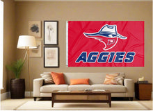 Load image into Gallery viewer, indoor display of red oklahoma panhandle state aggies flag for man cave decor
