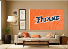 Load image into Gallery viewer, indoor display of orange cal state fullerton titans flag for man cave decor

