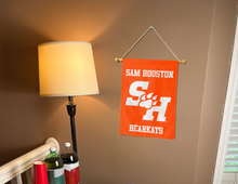 Load image into Gallery viewer, sam houston sh bearkats garden flag hung inside a well lit college dorm
