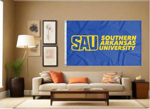 Load image into Gallery viewer, indoor display of blue southern arkansas university flag for man cave decor
