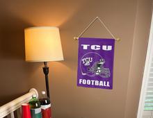Load image into Gallery viewer, purple tcu football garden flag hung inside a well lit dorm for college dorm decor

