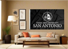 Load image into Gallery viewer, indoor display of black texas a&amp;m university san antonio flag for man cave decor
