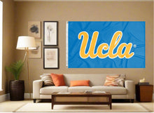Load image into Gallery viewer, indoor display of blue ucla flag with gold ucla logo for man cave decor
