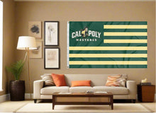 Load image into Gallery viewer, indoor display of usa flag style cal poly mustangs flag for man cave decor
