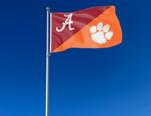 Load image into Gallery viewer, outdoor display of alabama clemson game day house divided flag for tailgate decor

