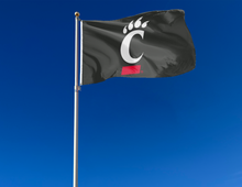 Load image into Gallery viewer, outdoor display of black university of cincinnati flag for tailgate decor
