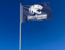 Load image into Gallery viewer, outdoor display of blue south alabama jaguars flag for tailgate decor
