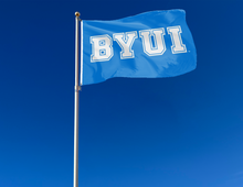Load image into Gallery viewer, outdoor display of blue byu idaho flag for tailgate decor
