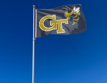Load image into Gallery viewer, outdoor display of navy georgia tech yellow jackets 3x5 flag for tailgate decor

