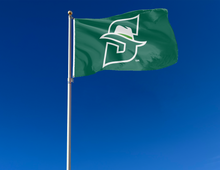 Load image into Gallery viewer, outdoor display of green stetson university flag for tailgate decor
