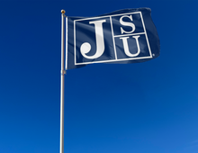 Load image into Gallery viewer, outdoor display of jackson state university flag with jsu logo for tailgate decor
