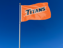 Load image into Gallery viewer, outdoor display of orange cal state fullerton titans flag for tailgate decor
