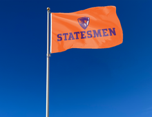 Load image into Gallery viewer, outdoor display of orange hobart flag with statesmen logo for tailgate decor
