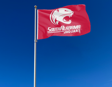 Load image into Gallery viewer, outdoor display of red south alabama jaguars flag for tailgate decor

