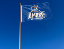 Load image into Gallery viewer, outdoor display of blue umary marauders flag for tailgate decor
