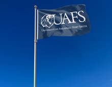 Load image into Gallery viewer, outdoor display of blue university of arkansas fort smith flag with uafs logo for tailgate decor
