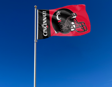 Load image into Gallery viewer, outdoor display of university of cincinnati flag with cincinnati bearcats football logo for tailgate decor
