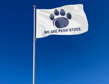 Load image into Gallery viewer, outdoor display of white penn state university flag with we are penn state logo for tailgate decor
