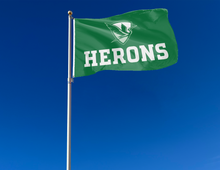 Load image into Gallery viewer, outdoor display of green william smith flag with herons logo for tailgate decor
