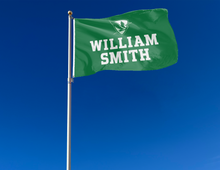 Load image into Gallery viewer, outdoor display of green william smith herons flag for tailgate decor
