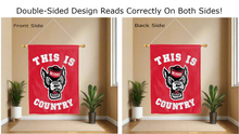 Load image into Gallery viewer, this is nc state wolfpack country logo reading correctly on both sides of red double sided house flag
